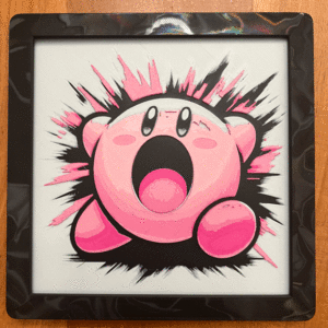 A vibrant 3D printed artwork of Kirby, featuring pink hues and a dynamic, energetic design, framed in a sleek 8x8 PLA frame.