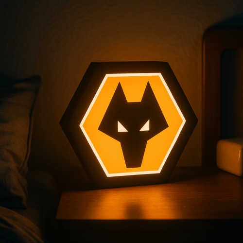 Wolverhampton Wanderers LED lightbox illuminating a bedroom with the iconic wolf logo in focus.